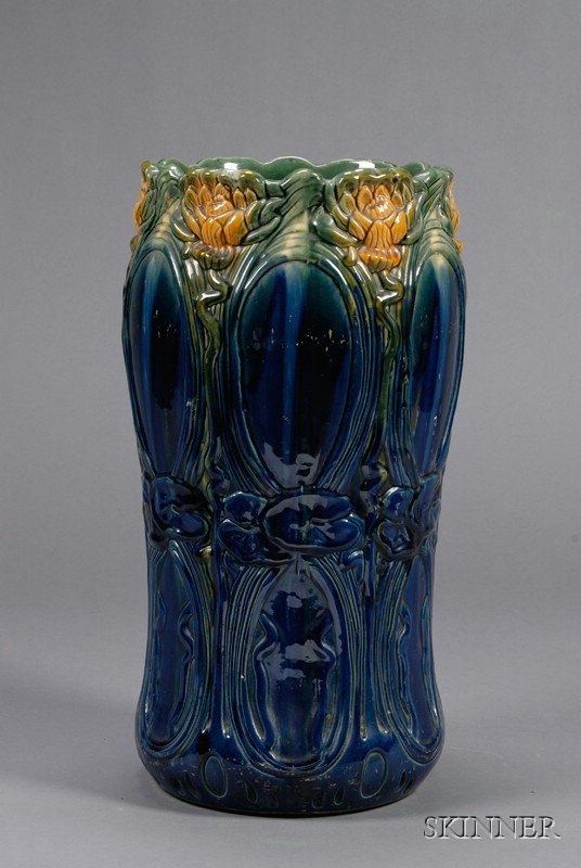 Majolica Glazed Earthenware Umbrella Stand, Americ: Majolica Glazed Earthenware Umbrella Stand, America, 19th century, Weller-style, stylized water lily design in blue, green, and yellow enamel, ht. 21 1/4 in.
