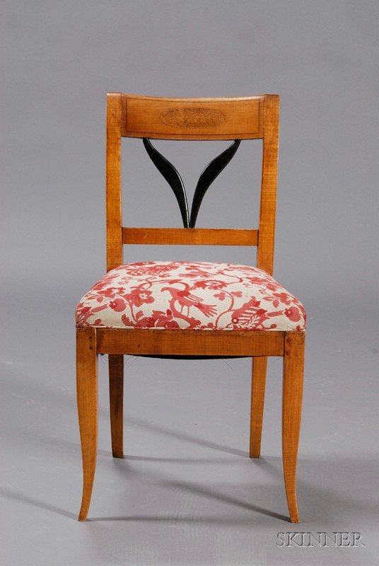 Biedermeier Fruitwood-inlaid and Part-ebonized Map: Biedermeier Fruitwood-inlaid and Part-ebonized Maple Side Chair, c. 1830, scrolled backrest with oval birch panel with anthemion inlay, overupholstered seat and square, tapered, and splayed legs, seat