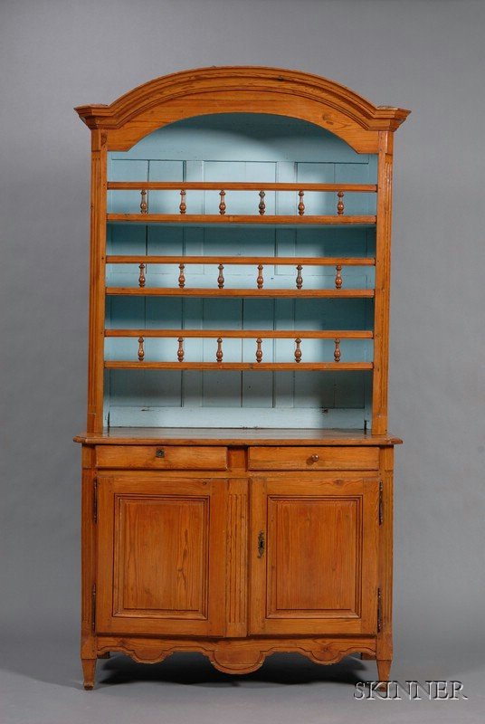 French Provincial Pine Buffet a Deux Corps, upper : French Provincial Pine Buffet a Deux Corps, upper section with molded cornice above three open shelves with spindle-inset galleries; lower section with two drawers above a pair of paneled doors, squar