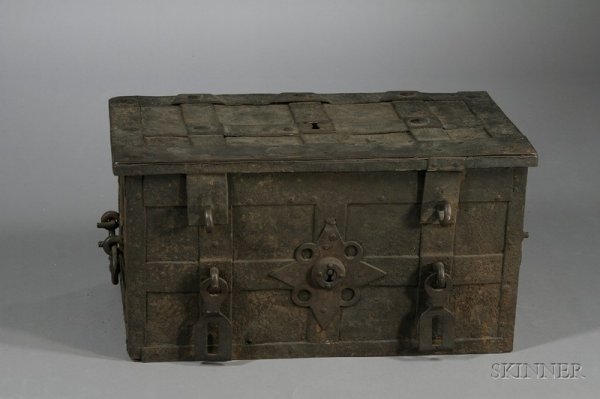 Large Mediaeval-style Iron Strong Box, with studde: Large Mediaeval-style Iron Strong Box, with studded strapwork, star shaped escutcheon, locking hasps, and side lifting handles, wd. 30 1/2, ht. 16, dp. 16 1/2 in. Provenance: Higgins Armory Museum, Wo