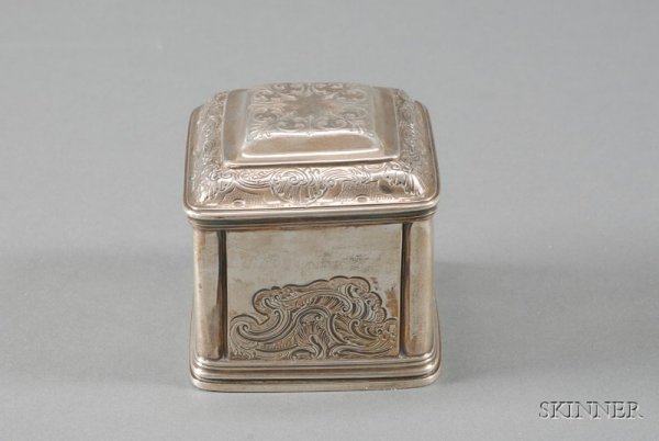 George II Silver Tea Caddy Box, London, 1741, make: George II Silver Tea Caddy Box, London, 1741, maker's mark AC, possibly Augustus Courtauld, square, with rounded corners, tiered lid, chased and embossed with rocaille edging and detailing, ht. 3 1/2,