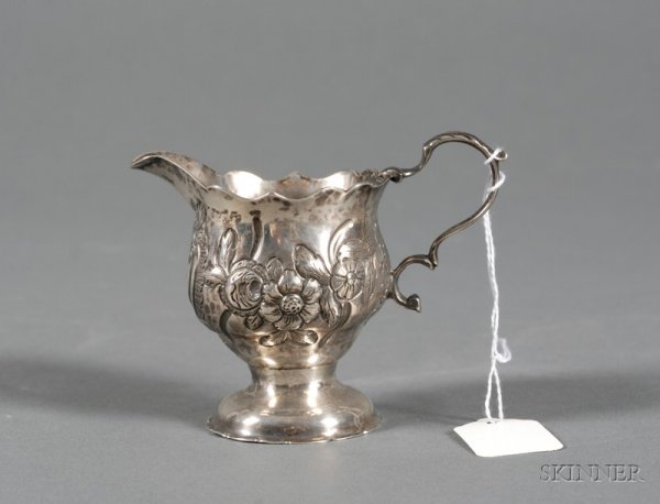 George III Silver Creamer, London, 1764, Alexander: George III Silver Creamer, London, 1764, Alexander Saunders, maker, pear shaped, with ogee rims, domed foot, later chased and embossed with flowers, contemporary monogram, ht. 3 1/4 in., approx. 2 tro
