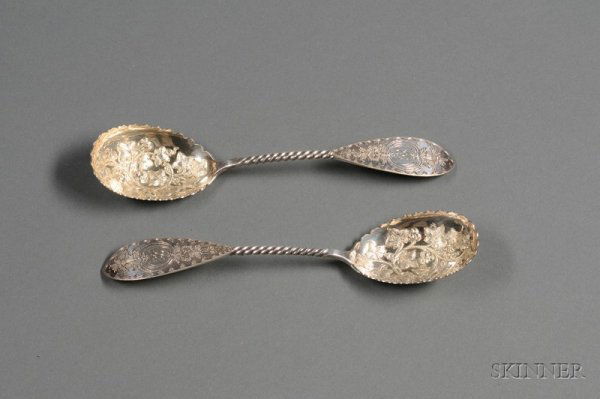 Pair of Bailey & Co./George Sharp Coin Silver Berr: Pair of Bailey & Co./George Sharp Coin Silver Berry Spoons, mid-19th century, the oval bowls with scalloped rim, chased and embossed with berried ivy vines, with partially twisted stem, ending in an e