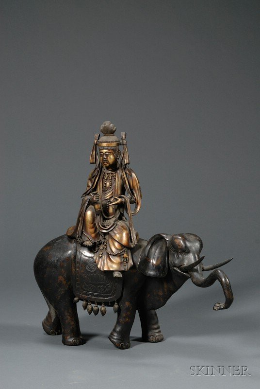 Bronze Image of a Buddhist Divinity, Japan, late 1: Bronze Image of a Buddhist Divinity, Japan, late 19th century, Samantabadra in gilt seated on an elephant, ht. 24 in.