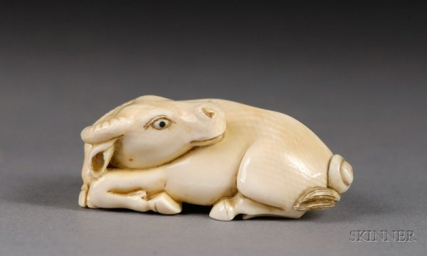 Ivory Snuff Bottle, China, 19th century, study of : Ivory Snuff Bottle, China, 19th century, study of a reclining ox, lg. 2 in.