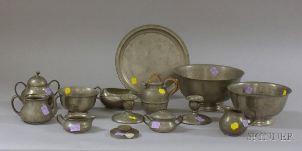 Fourteen Pieces of Assorted Pewter Tableware, inclu: Fourteen Pieces of Assorted Pewter Tableware, including three Revere-type footed bowls, a tray, six pieces of teaware, a pair of candleholders, a paperweight, and a small bowl with handle.