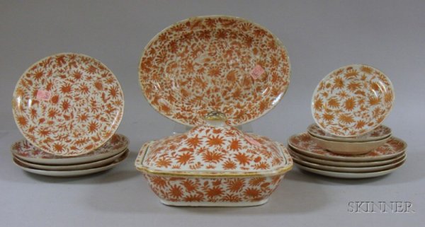 Thirteen Pieces of Chinese Export Porcelain Orange: Thirteen Pieces of Chinese Export Porcelain Orange Fitzhugh Pattern Tableware, a covered serving dish, a set of seven plates, a platter, and four small dishes.