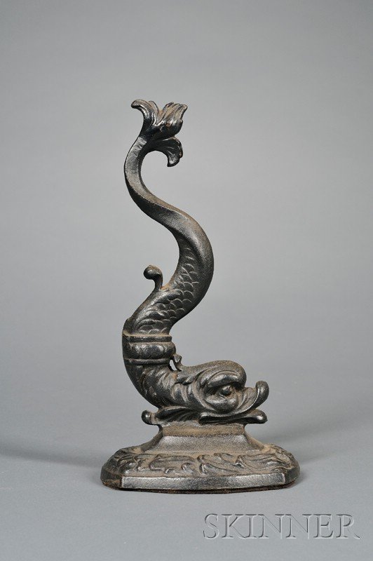 Black-painted Cast Iron Dolphin Doorstop, America,: Black-painted Cast Iron Dolphin Doorstop, America, early 20th century, ht. 12 in.