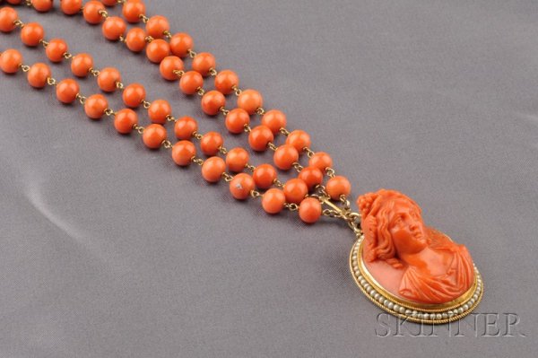 Antique Coral Cameo Pendant Necklace, the high rel: Antique Coral Cameo Pendant Necklace, the high relief cameo depicting a bacchante framed by seed pearls and suspended from a double strand of coral beads completed by a box clasp, 14kt gold mount, lg.