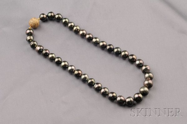 Tahitian Pearl Necklace, composed of thirty-seven : Tahitian Pearl Necklace, composed of thirty-seven semi-baroque pearls, graduating slightly from approx. 10.90 to 12.50 mm, completed by an 18kt gold and rose-cut diamond boule clasp, lg. 18 in.