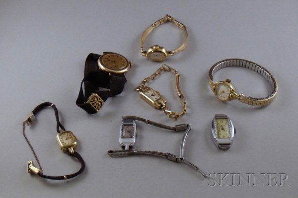 Seven Mostly Gold-Filled Lady's Wristwatches, make: Seven Mostly Gold-Filled Lady's Wristwatches, makers include Hamilton, Bulova, Gruen, Elgin, and Caravelle.
