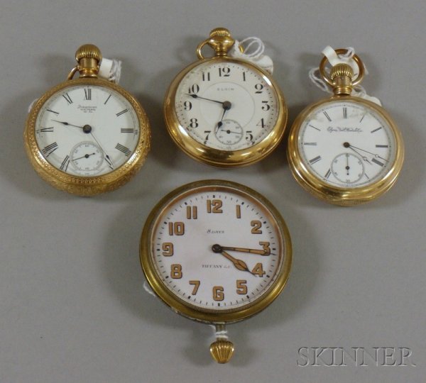 Three Gold-Filled Pocket Watches and a Tiffany & : Three Gold-Filled Pocket Watches and a Tiffany & Co. Travel Clock, two pocket watches by Elgin and one by American Waltham, the travel clock marked on dial, 8 Days and Tiffany & Co. and the movement, 