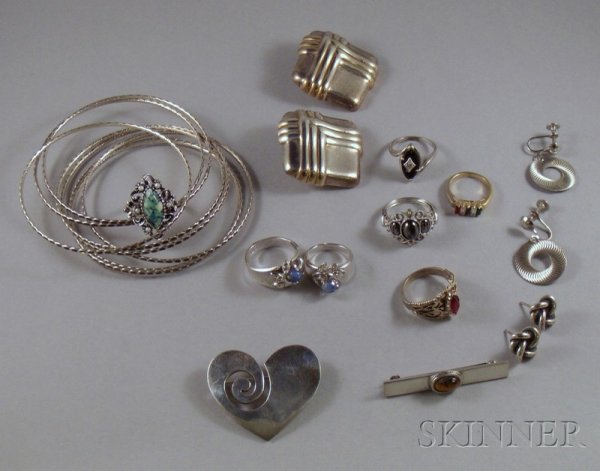 Small Group of Sterling Silver and Costume Jewelry: Small Group of Sterling Silver and Costume Jewelry, including a set of eight bangles, three pairs of earrings, a heart-form brooch, a bar pin, a sterling silver ring, and six costume rings.