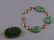 377: 14kt Gold and Jade Bracelet and a 14kt Gold, Carve