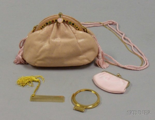 Judith Leiber Pink Reptile Skin Evening Purse, 198: Judith Leiber Pink Reptile Skin Evening Purse, 1980s, signed, with cabochon decorated frame and clasp, containing the change purse, comb, and mirror accessories, with cloth dust bag.