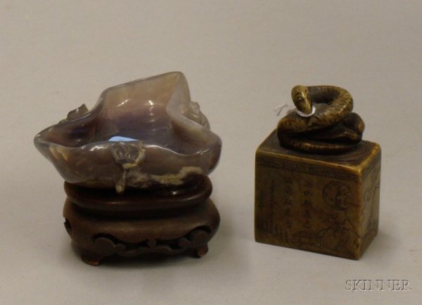 Chinese Carved Soapstone Seal and Carved Amethyst-: Chinese Carved Soapstone Seal and Carved Amethyst-colored Hardstone Figural Cup.