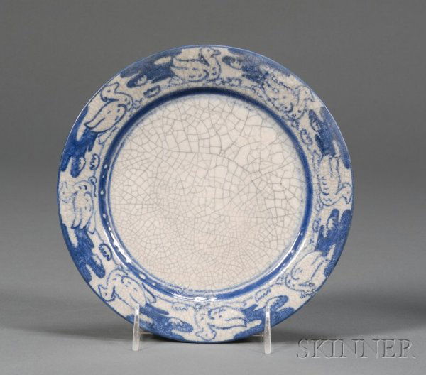 Dedham Pottery Duck Plate Glazed earthenware Dedham: Dedham Pottery Duck Plate Glazed earthenware Dedham, Massachusetts Blue and white duck border with crackle glaze, pottery mark and one impressed rabbit, imperfections in the making, dia. 8 1/2 in.