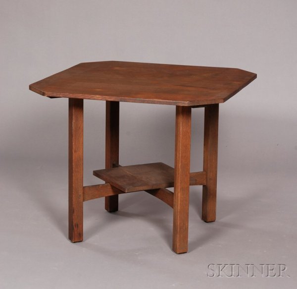 L. & J.G. Stickley Luncheon Table Oak Fayetteville,: L. & J.G. Stickley Luncheon Table Oak Fayetteville, New York, c. 1912 Square cut-corner top raised on four post legs with offset median shelf, branded mark, some stains and seam separation, ht. 29 1/8