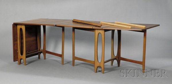 Mid-Century Folding Dining Table Walnut Rectangula: Mid-Century Folding Dining Table Walnut Rectangular top comprised of two sections each with two drop leafs with interlocking hardware, the ends with shaped oval cut-outs, raised on flat bar shape legs