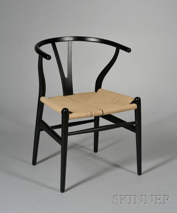 Hans Wegner Wishbone Chair Ebonized wood and cord: Hans Wegner Wishbone Chair Ebonized wood and cord seat Denmark, 20th century Black finish with curvilinear back over wishbone shape splat, natural cord seat, numbered 76 on base, ht.28 1/2, wd. 19 in.