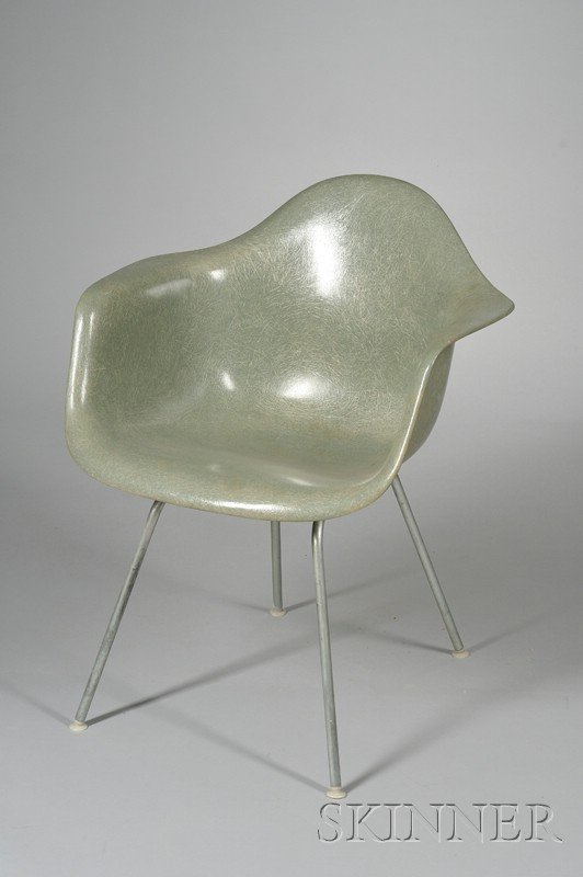 Modern Classic Fiberglass Armchair Fiberglass, met: Modern Classic Fiberglass Armchair Fiberglass, metal, and rubber United States, mid 20th century Moss green bucket with large rubber mounts on four metal rod legs, unmarked, ht. 31 1/2, 24 1/2 in.