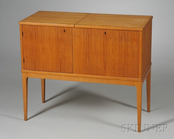 Scandinavian-style Office Cabinet Hardwood veneers: Scandinavian-style Office Cabinet Hardwood veneers Rectangular lift top, compartment fitted for files flanked by a compartment fitted with thin composition shelving, raised on four square tapered legs
