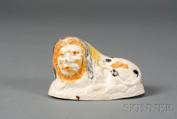 Pratt-type Pearlware Model of a Lion, England, late: Pratt-type Pearlware Model of a Lion, England, late 18th century, underglaze enamel decorated, ht. 2 1/2 in.