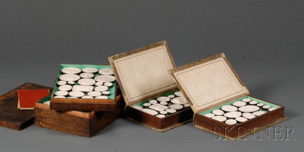 Group of Italian "Grand Tour" Plaster Intaglio Med: Group of Italian "Grand Tour" Plaster Intaglio Medallions, Rome, mid to late 19th century, Giovanni Liberotti, maker, comprising a set of two, in half vellum book-form cases with spines labeled "Liber