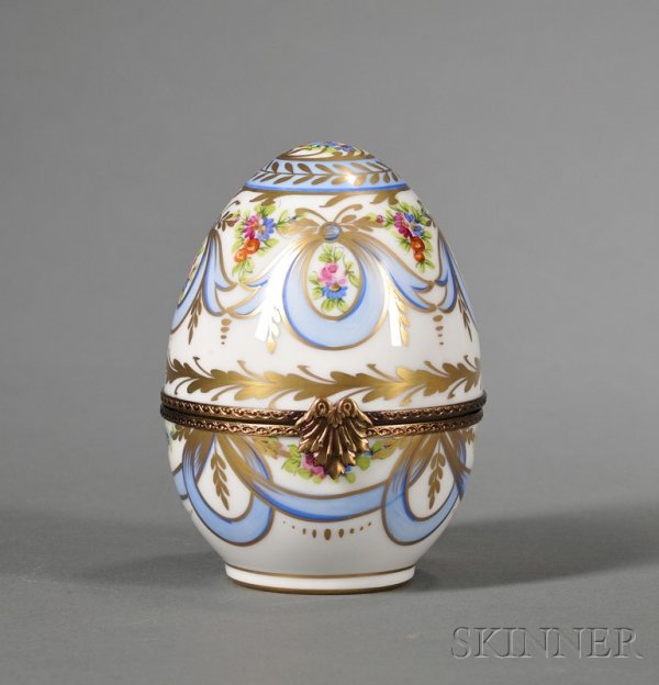Three European Porcelain Articles, 20th century, c: Three European Porcelain Articles, 20th century, comprising a pair of Mottahedeh fruit coolers, printed with roundels of hunting scenes within cobalt blue borders, marked Limited Series No. 096/150, h