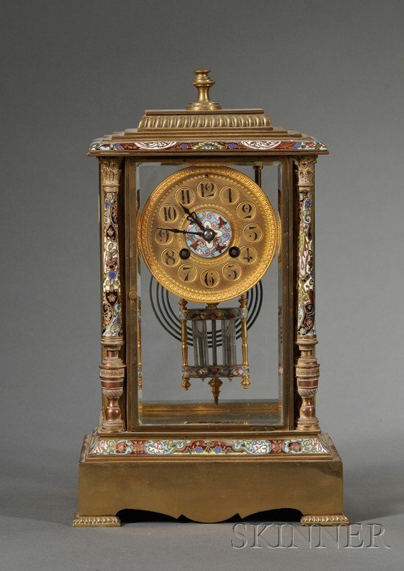 French Bronze and Champleve Enamel Mantel Clock, l: French Bronze and Champleve Enamel Mantel Clock, late 19th/early 20th century, with two-train, half striking Marti movement, gorge case with columns to front sides, columns and edges with multicolored