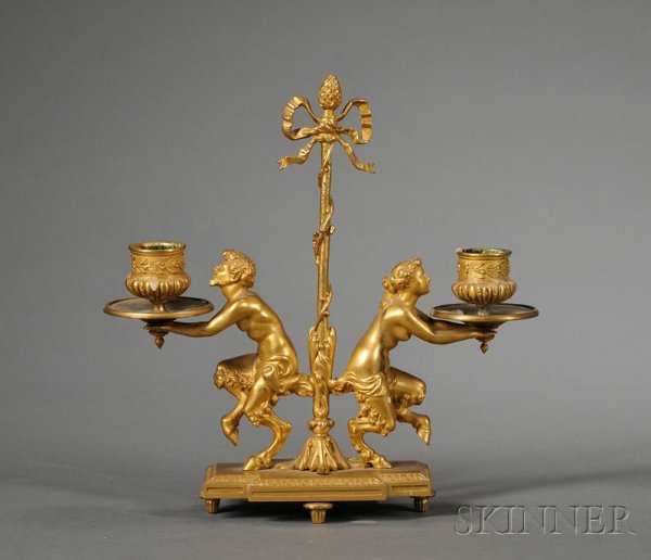 Louis XVI-style Bronze Dore Two Light Desk Candela: Louis XVI-style Bronze Dore Two Light Desk Candelabrum, late 19th century, with central staff-form lifting handle, flanked pair of figures of dancing male and female satyrs holding candle nozzles, on 