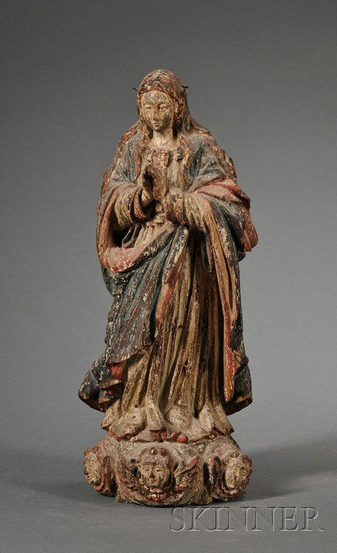 Carved and Painted Wood Santos Figure of the Madon: Carved and Painted Wood Santos Figure of the Madonna, carved standing, with hands folded in prayer, in blue and red painted robe, ht. 15 3/4 in.