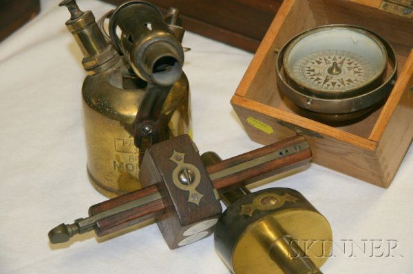 Two Scribes, a Blowtorch and a Compass, brass and: Two Scribes, a Blowtorch and a Compass, brass and wooden tenon scribes, one marked P.A. French, brass blowtorch marked British Monitor Made and a gimbaled Japanese compass with a 2 1/4 in. compass car