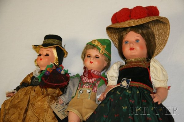 Three Celluloid Costume Dolls, 1950s, Rheinische G: Three Celluloid Costume Dolls, 1950s, Rheinische Gummi Bavarian girl with rigid neck, open/closed mouth with painted teeth, fixed blue acrylic eyes, jointed hips and shoulders, original regional costu