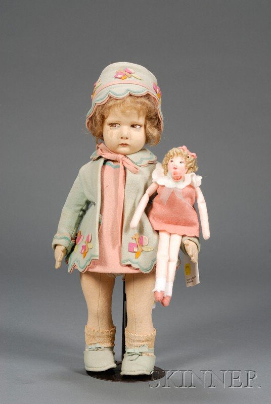Lenci Felt Girl Doll, 1920s-30s, with pressed felt: Lenci Felt Girl Doll, 1920s-30s, with pressed felt face, full cheeks and chin, closed pouty mouth, painted brown side-glancing eyes, wavy dark blonde mohair wig, swivel joints, hands with three finger