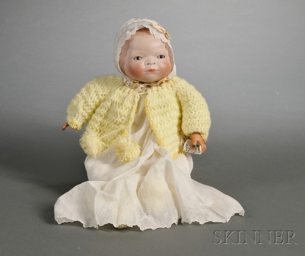 Grace Storey Putnam Bisque Bye Lo-Baby, impressed : Grace Storey Putnam Bisque Bye Lo-Baby, impressed Copr. by Grace S. Putnam, Made in Germany, with flange neck, domed head with brushed hair, closed mouth, weighted brown glass eyes, cloth body with By