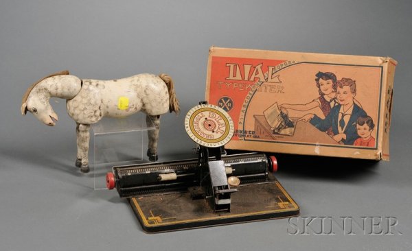 Two Table Toys and a Schoenhut Circus Horse, early: Two Table Toys and a Schoenhut Circus Horse, early 20th century, Marx "Dial" black-painted steel typewriter with instructions; printed cardboard "Gable Villa" green red-roofed cottage to be assembled;
