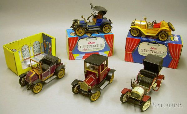 Five Schuco "Old Timer" Clockwork Automobiles, mid: Five Schuco "Old Timer" Clockwork Automobiles, mid-20th century, lithographed metal and plastic, boxed No. 1225 Mercer Type 35 D/1913, No. 1228 Opel Doktor Wagen 1909, and No. 1230 Renault 1991 (missi