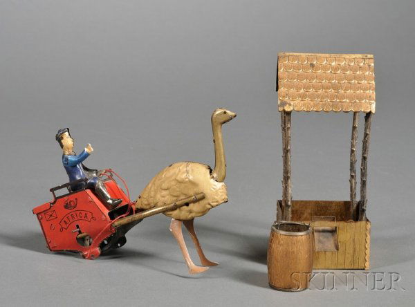 Two Metal Toys, early 20th century, Lehmann lithog: Two Metal Toys, early 20th century, Lehmann lithographed and painted "Africa," No. 170, fly-wheel driven, ostrich-drawn, two-wheel red mail cart with black driver, (ostrich damaged, cart wheels missin