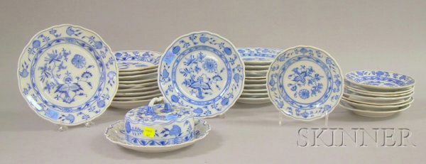 Twenty-nine Pieces of Meissen Blue Onion Pattern P: Twenty-nine Pieces of Meissen Blue Onion Pattern Porcelain Tableware, a butter dish with cover, sets of ten plates, three dishes, ten plates, and five dishes, oval blue mark and blue cross over "Meiss