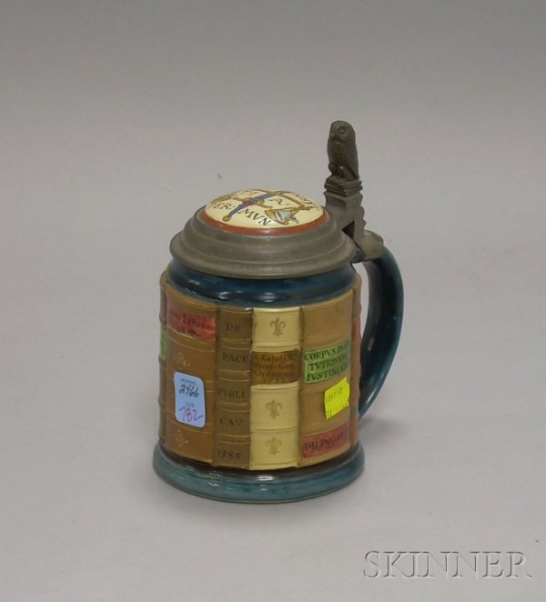 Mettlach Stoneware Legal Books Lidded Stein, 1/2 l: Mettlach Stoneware Legal Books Lidded Stein, 1/2 liter, with scales inlaid lid and pewter owl figural thumb lift, stamped and impressed marks 2001.