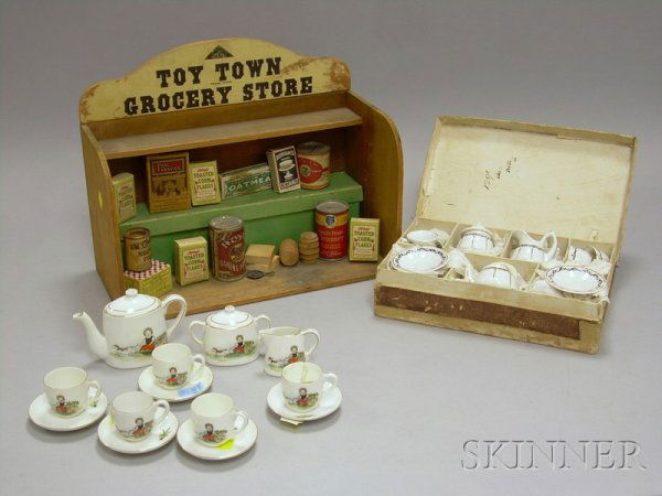 Group of Toy and Doll Items, a wooden Parker Bros.: Group of Toy and Doll Items, a wooden Parker Bros. "Toy Town Grocery Store" with twelve miniature stock items, a thirteen-piece Nippon hand-painted girl with dog tea set, a fifteen-piece hand-painted