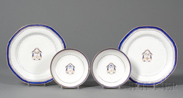 Four Chinese Export Armorial Porcelain Items, earl: Four Chinese Export Armorial Porcelain Items, early 19th century, two small shallow bowls decorated at the center with a blue and gilt mantle over a monogrammed shield suspended by a blue bowknot; two