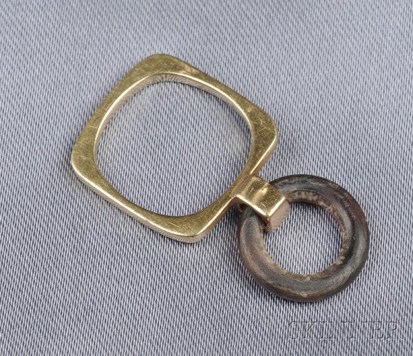 Abstract Design 18kt Gold Ring, Dinh Van, Cartier,: Abstract Design 18kt Gold Ring, Dinh Van, Cartier, set with a brown resin ring, size 3 3/4, no. 38364, signed.