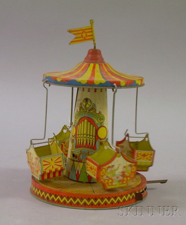 Lithographed Tin Wind-up Carousel Toy.: Lithographed Tin Wind-up Carousel Toy, c. mid-20th century, (revolves, scattered surface corrosion, wear, dents and bends, imperfections).