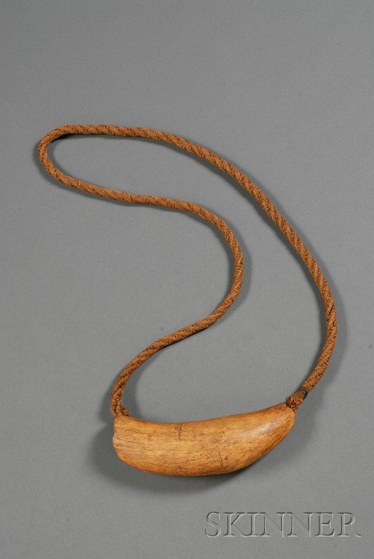 Polynesian Fiber and Whale Tooth Necklace, Fiji, T: Polynesian Fiber and Whale Tooth Necklace, Fiji, Tabua, 19th century, braided fiber cord, the tooth with "E" incised on one side, dark patina, tooth lg. 7 in.