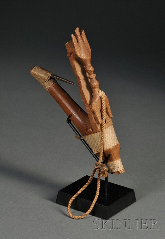 Northwest Coast Carved Wood Halibut Hook, c. late: Northwest Coast Carved Wood Halibut Hook, c. late 19th century, decorated with two facing avian forms, with cord binding, custom stand, lg. 9 1/2 in.