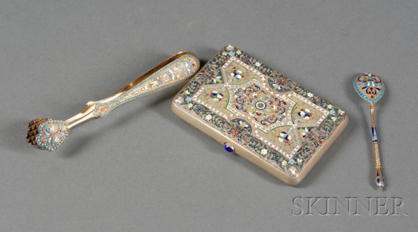 Three Russian Gold Washed Silver and Enameled Artic: Three Russian Gold Washed Silver and Enameled Articles, comprising a pair of Klingert sugar tongs, c. 1892, lg. 5 7/8, a Moscow cigarette case, 1927-58, with light and dark green enameling and blue ca
