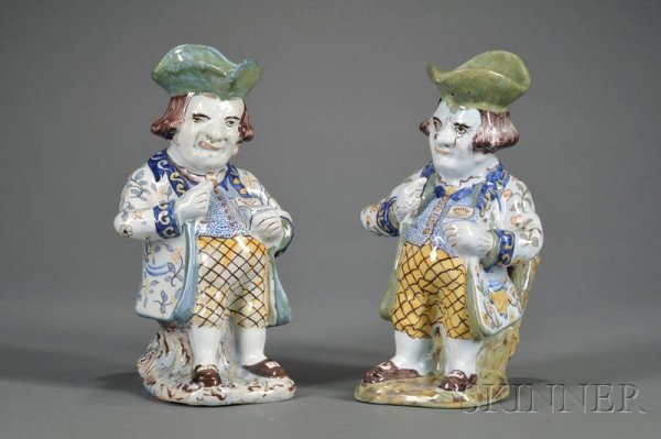 Two Similar French Faience Snuff-taker Toby Jugs,: Two Similar French Faience Snuff-taker Toby Jugs, France, 19th century, each polychrome enamel decorated, ht. 11 in.