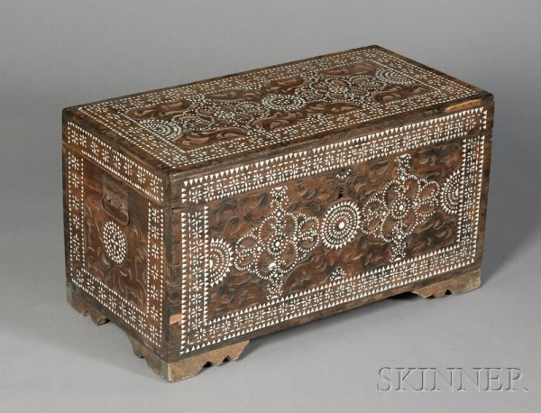 Middle Eastern Mother-of-Pearl Inlaid Hardwood Che: Middle Eastern Mother-of-Pearl Inlaid Hardwood Chest, with rectangular top and case with shallow carved designs of scrolling foliage and inlaid designs of sawtooth bordered geometric motifs on shorten